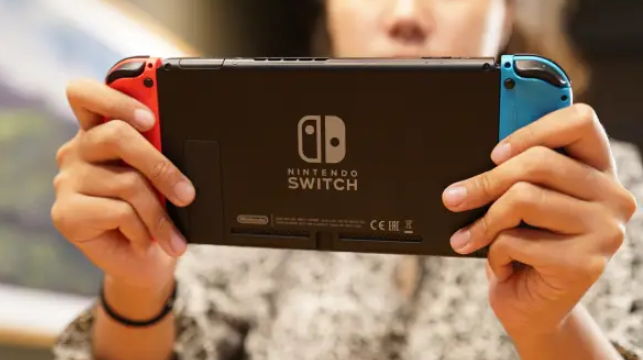 How and where do you insert an SD card into your Nintendo Switch?